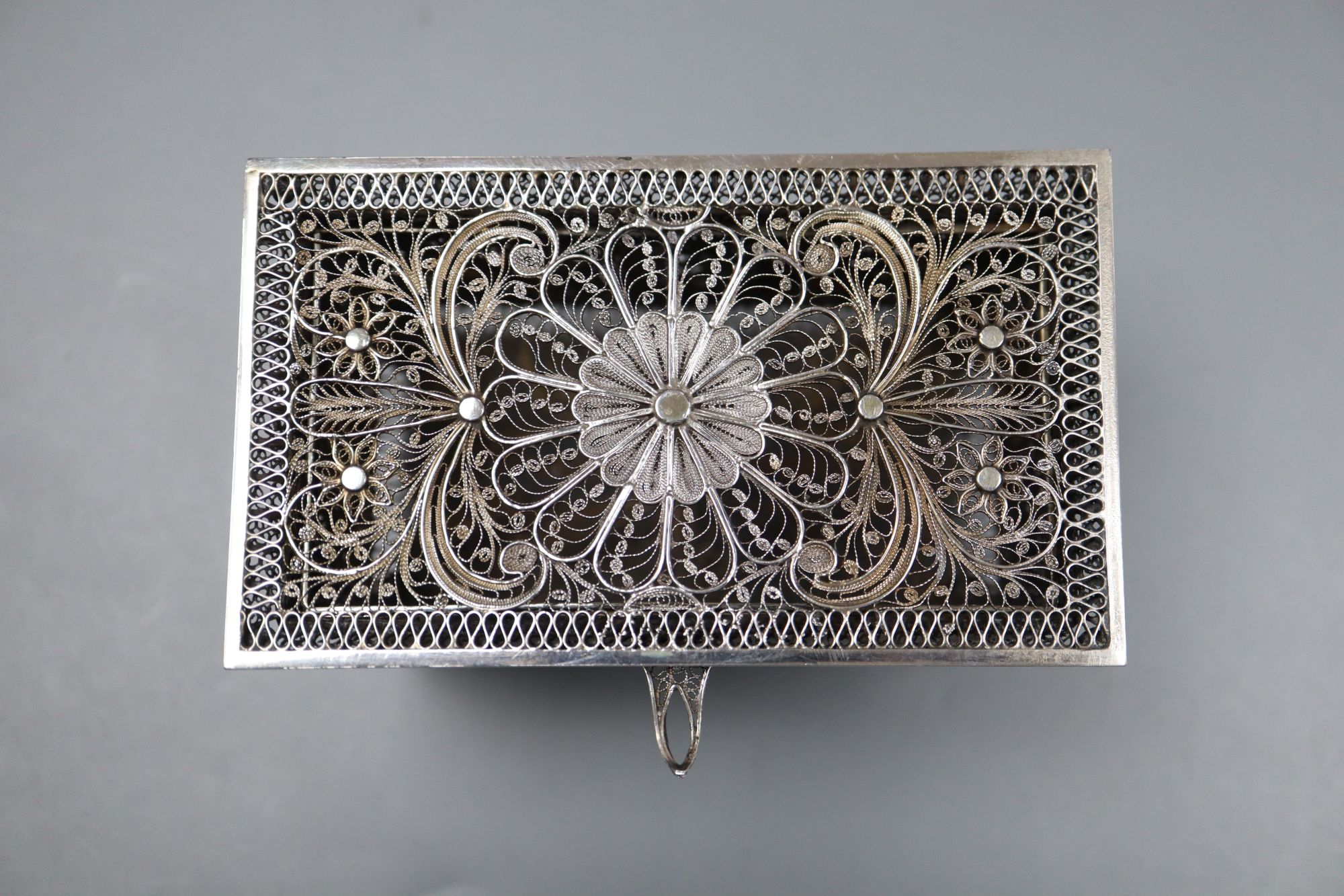 A group of small silver, plated and white metal items